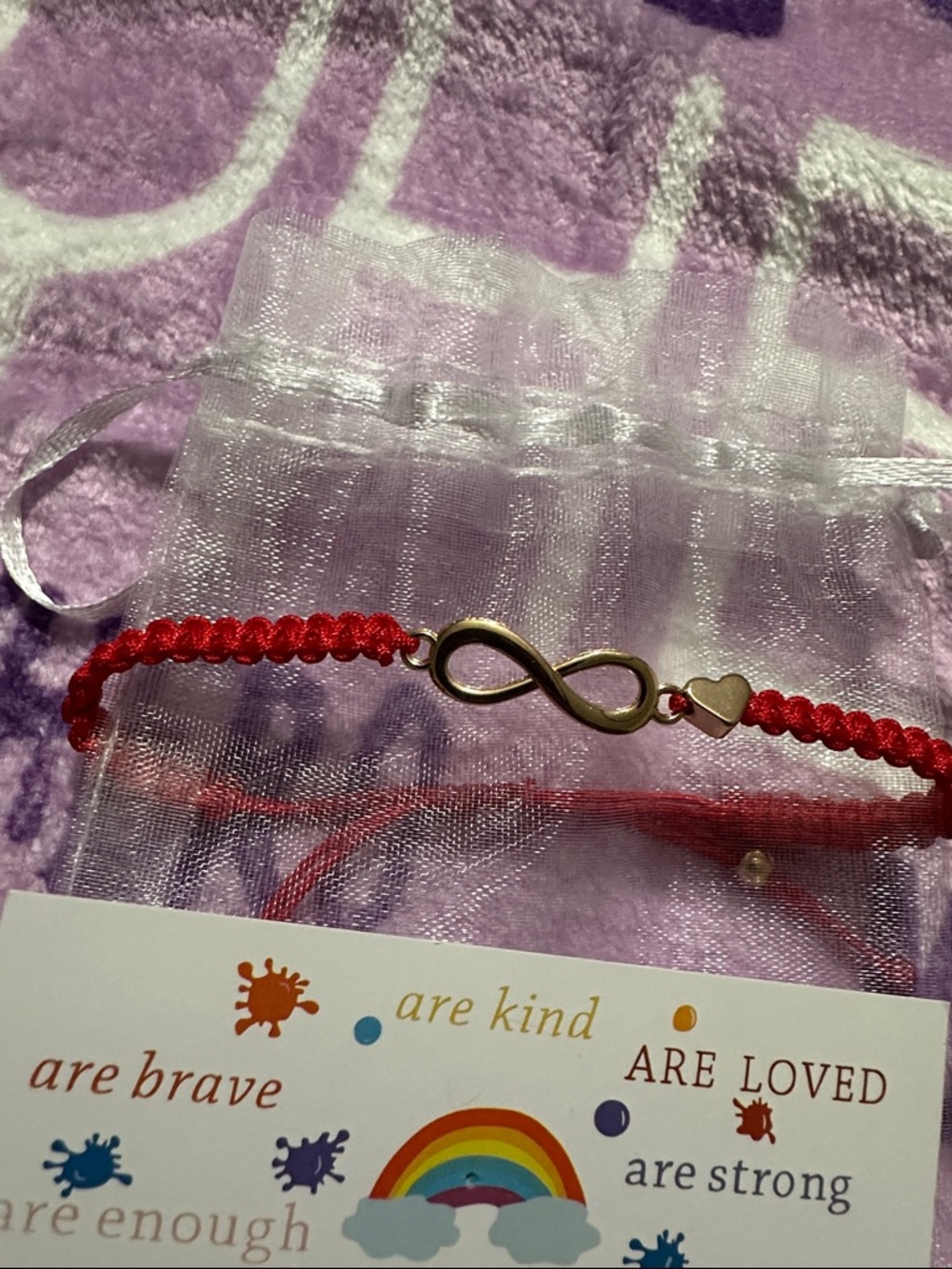 Gold Infinity Red Corded Adjustable Bracelet with affirmation card in sheer bag